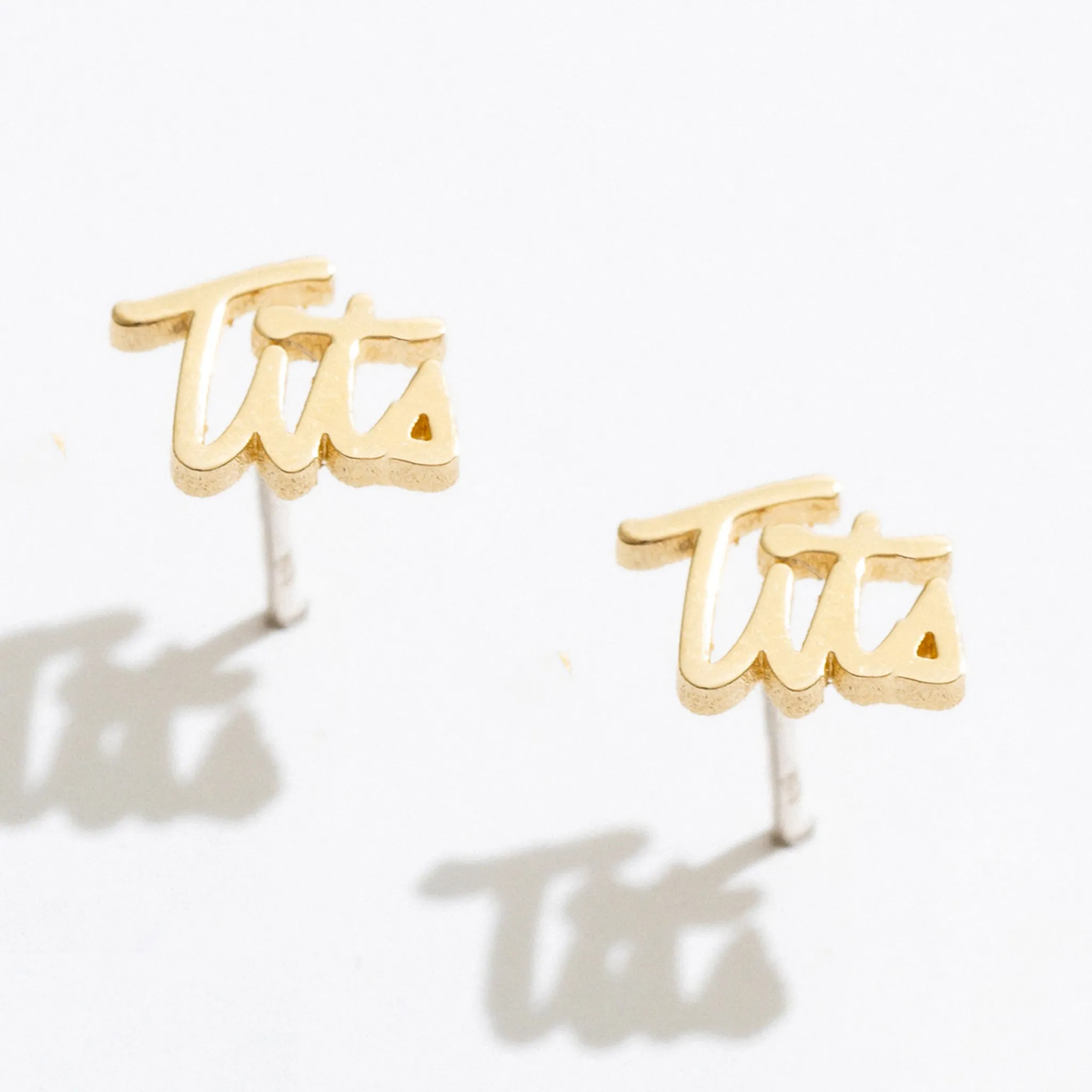 Tits Script Studs