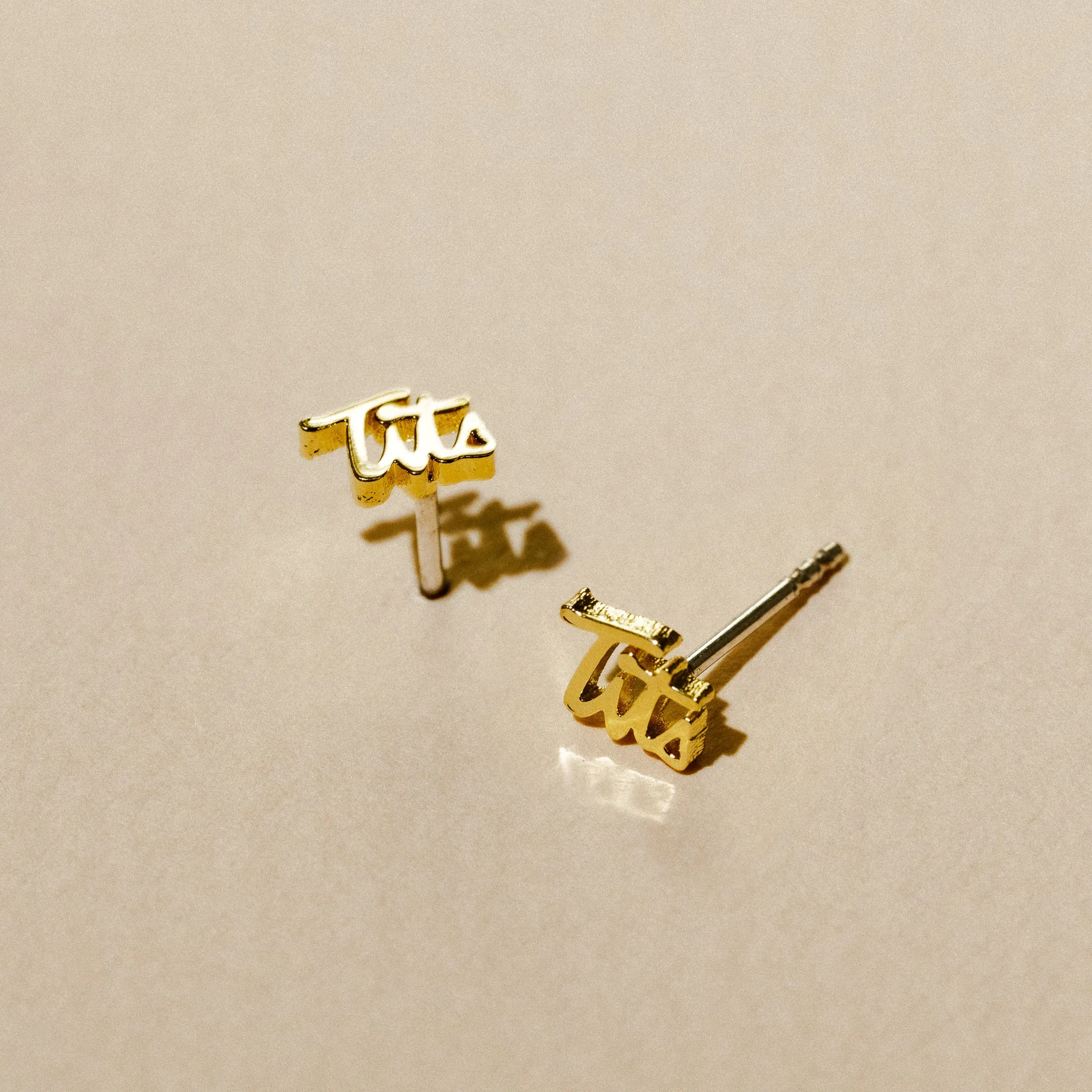 Tits Script Studs