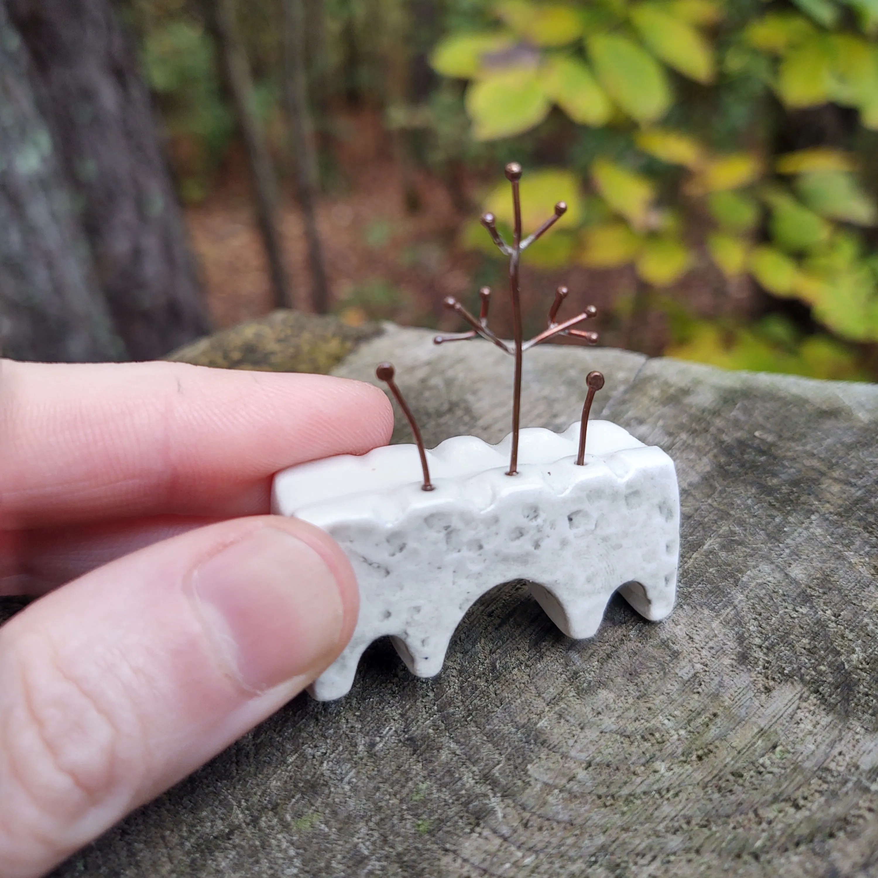 Viaduct Bridge in White with Copper Tree and Two Sprouts