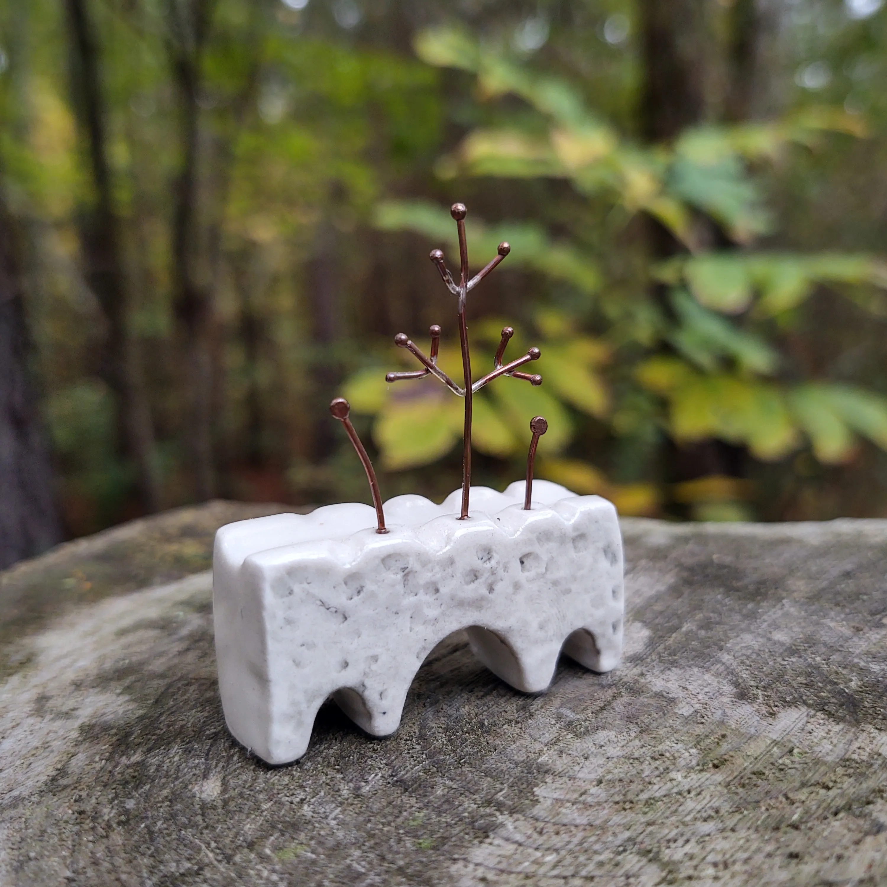 Viaduct Bridge in White with Copper Tree and Two Sprouts